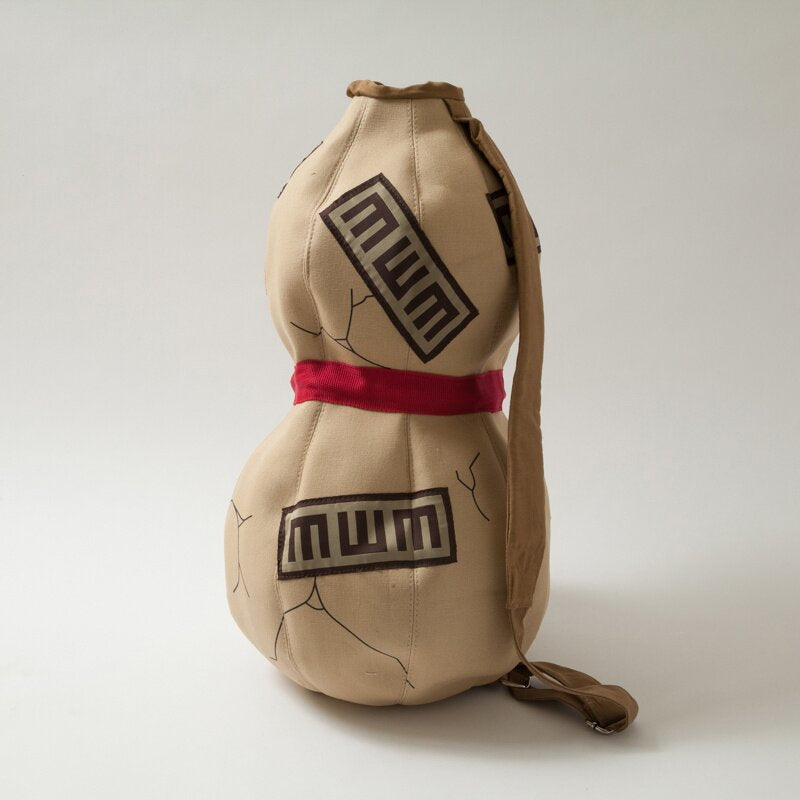 Side profile showcasing the gourd’s curvature and strap placement