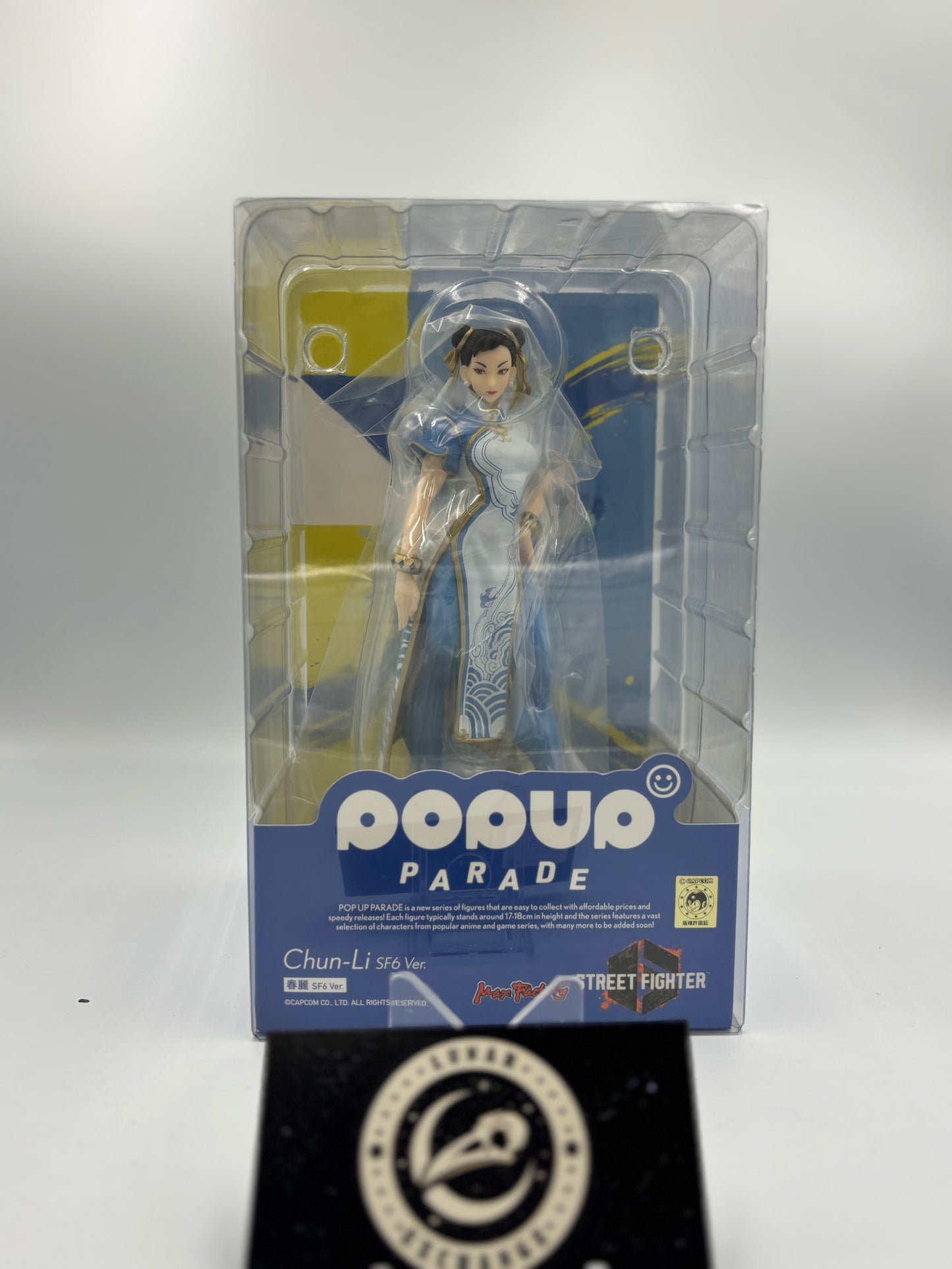 Packaged figure in its box