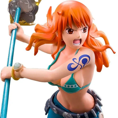Detailed close-up of Nami from One Piece holding her staff mid-attack, showcasing her expressive face, tattoo, and intricate sculpting on her bikini top and accessories.
