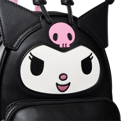 Angled close-up showing Kuromi's smirking face with embroidered eyes and smile.