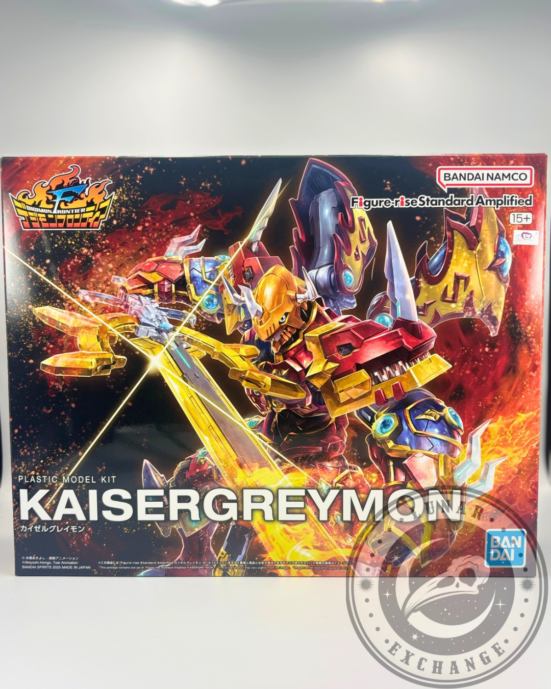 Front box art of KaiserGreymon Amplified model kit with fiery background and Digimon Frontier logo, featuring vivid artwork and Bandai branding.