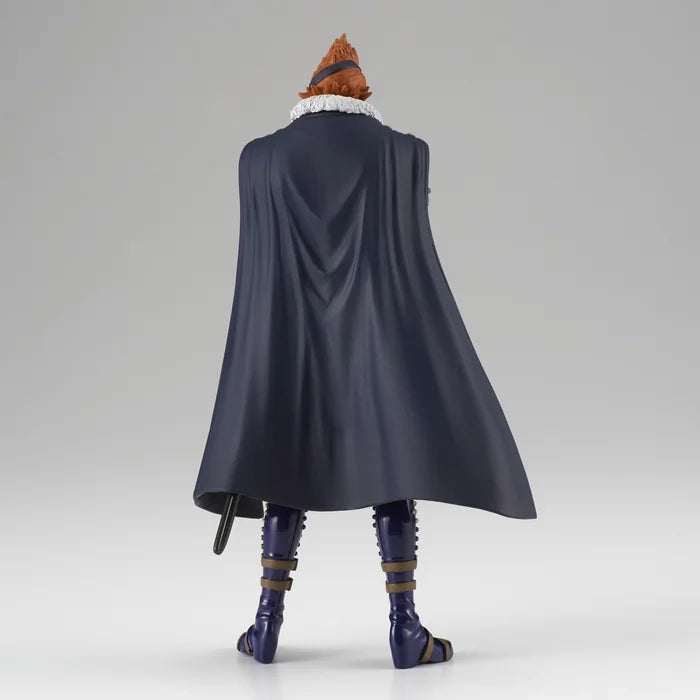 Rear angle highlighting the details of X Drake’s outfit.