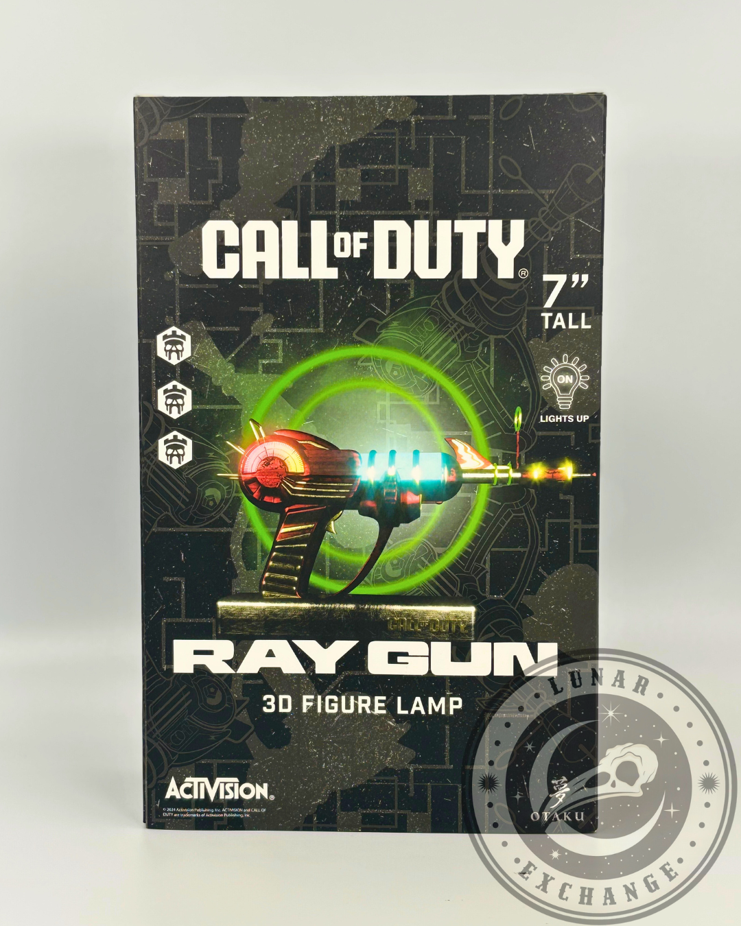 Front view of the Call of Duty Ray Gun 3D Figure Lamp packaging showing the LED-lit collectible design, product branding, and 7-inch height detail.