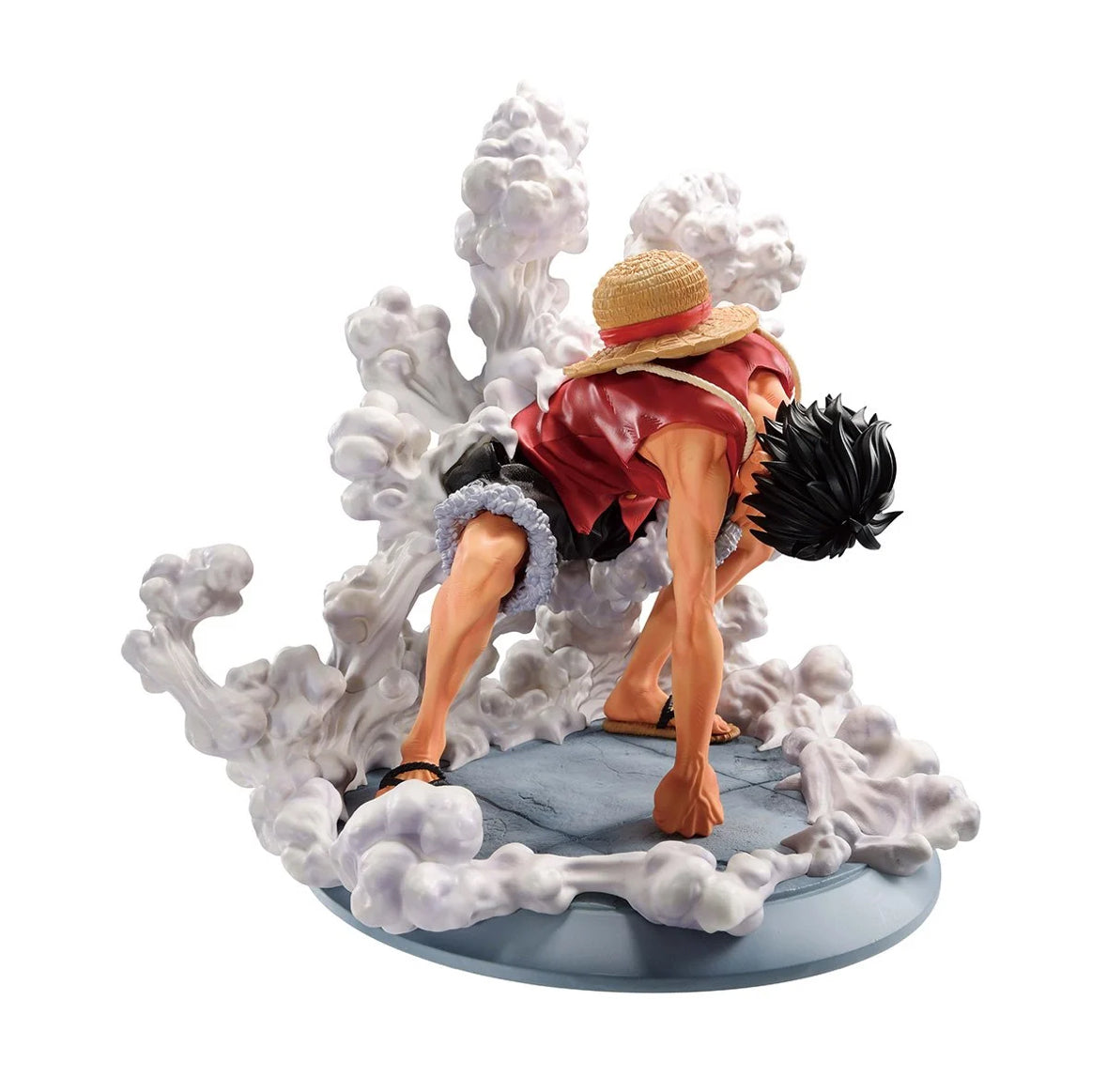 Side view of Bandai Spirits Monkey D. Luffy statue, highlighting anime-accurate facial features and shading.