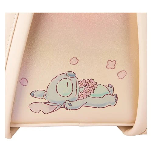Close-up of Loungefly Lilo & Stitch backpack showcasing faux leather material and embossed details.
