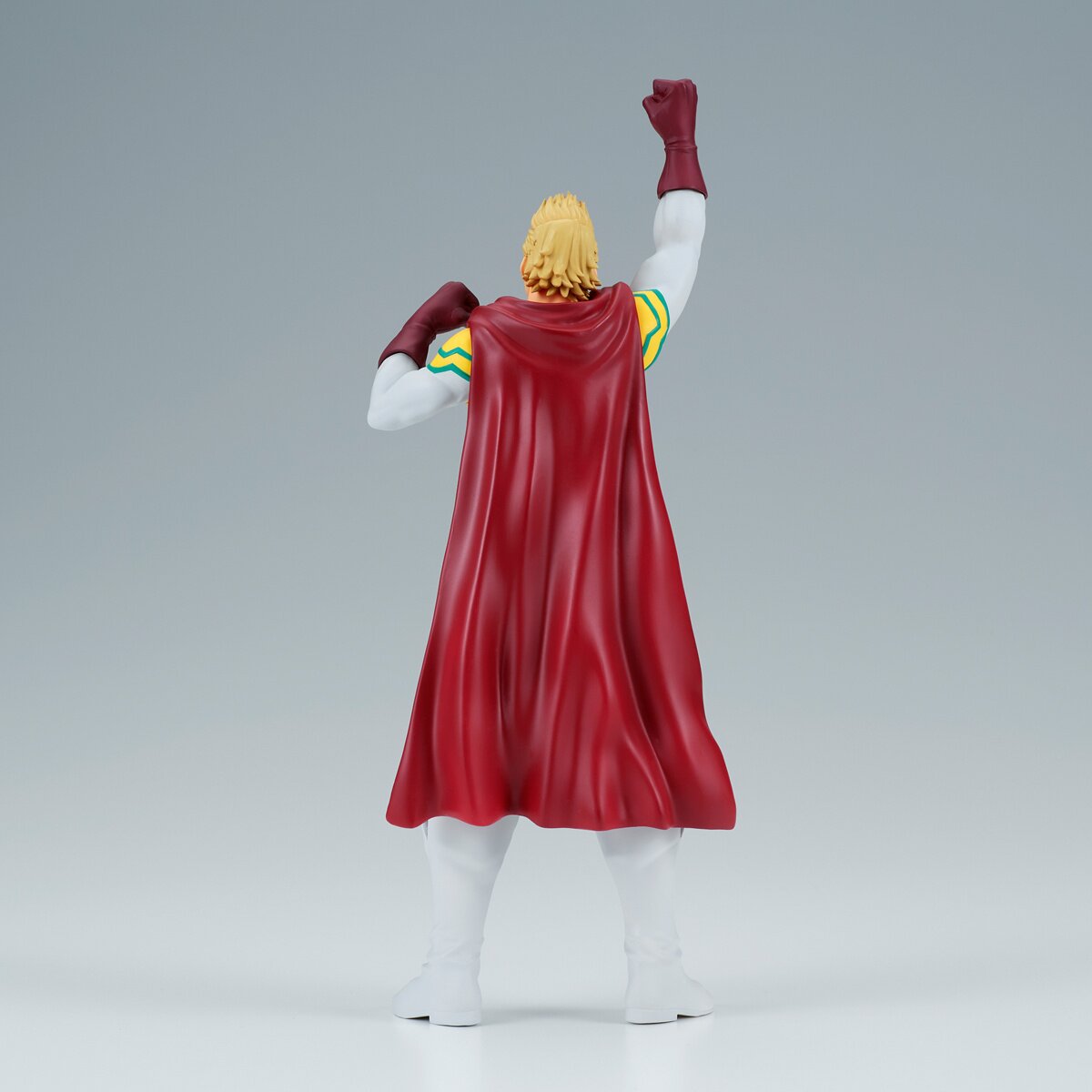 Rear view displaying the cape and costume details.