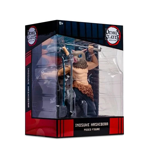 Side view Officially licensed Demon Slayer Inosuke Hashibira statue in original packaging.