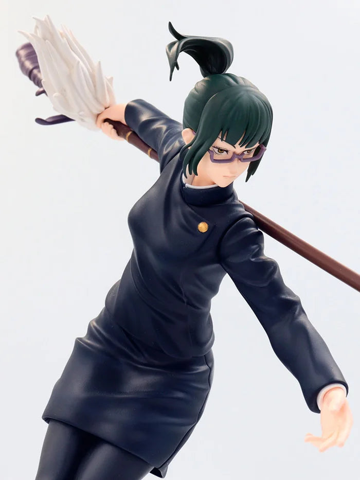 Close-up of Maki’s determined expression and glasses detail.
