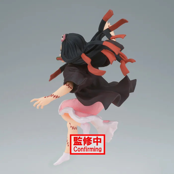 Back of figure showing outfit details and action pose.