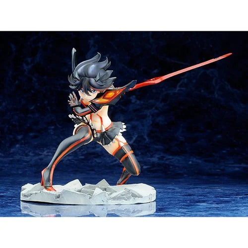 Action pose showing Ryuko charging forward with her blade across her body, on a blue stone-like base.