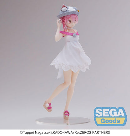 Side profile showcasing Ram's cat-ear straw hat and flowing dress.