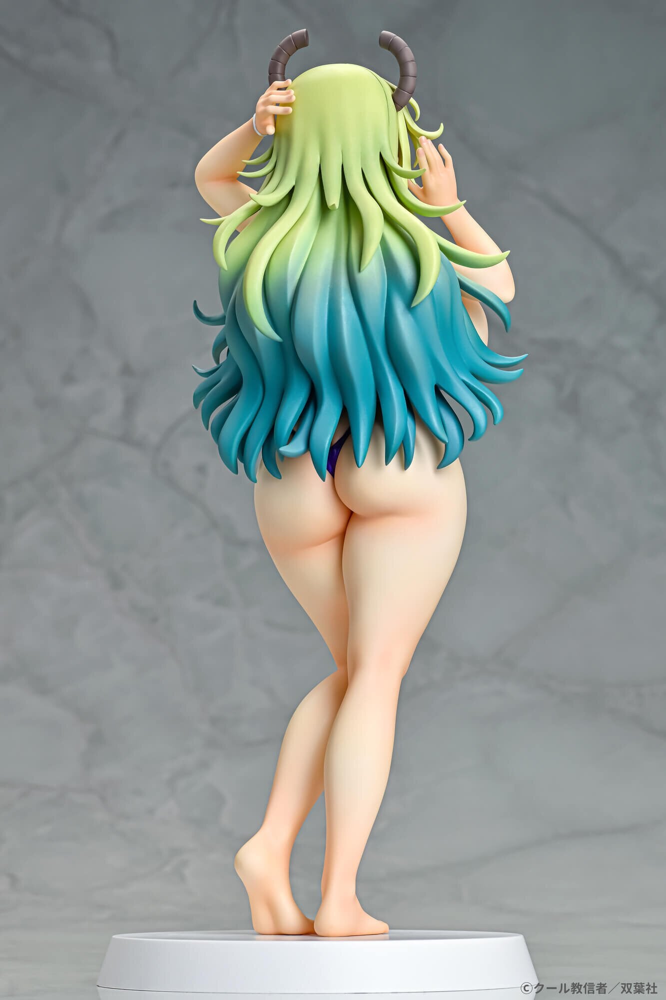 Rear angle highlighting the craftsmanship of Lucoa’s figure.