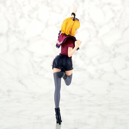 Rear view displaying the figure's sculpted hair and clothing folds.