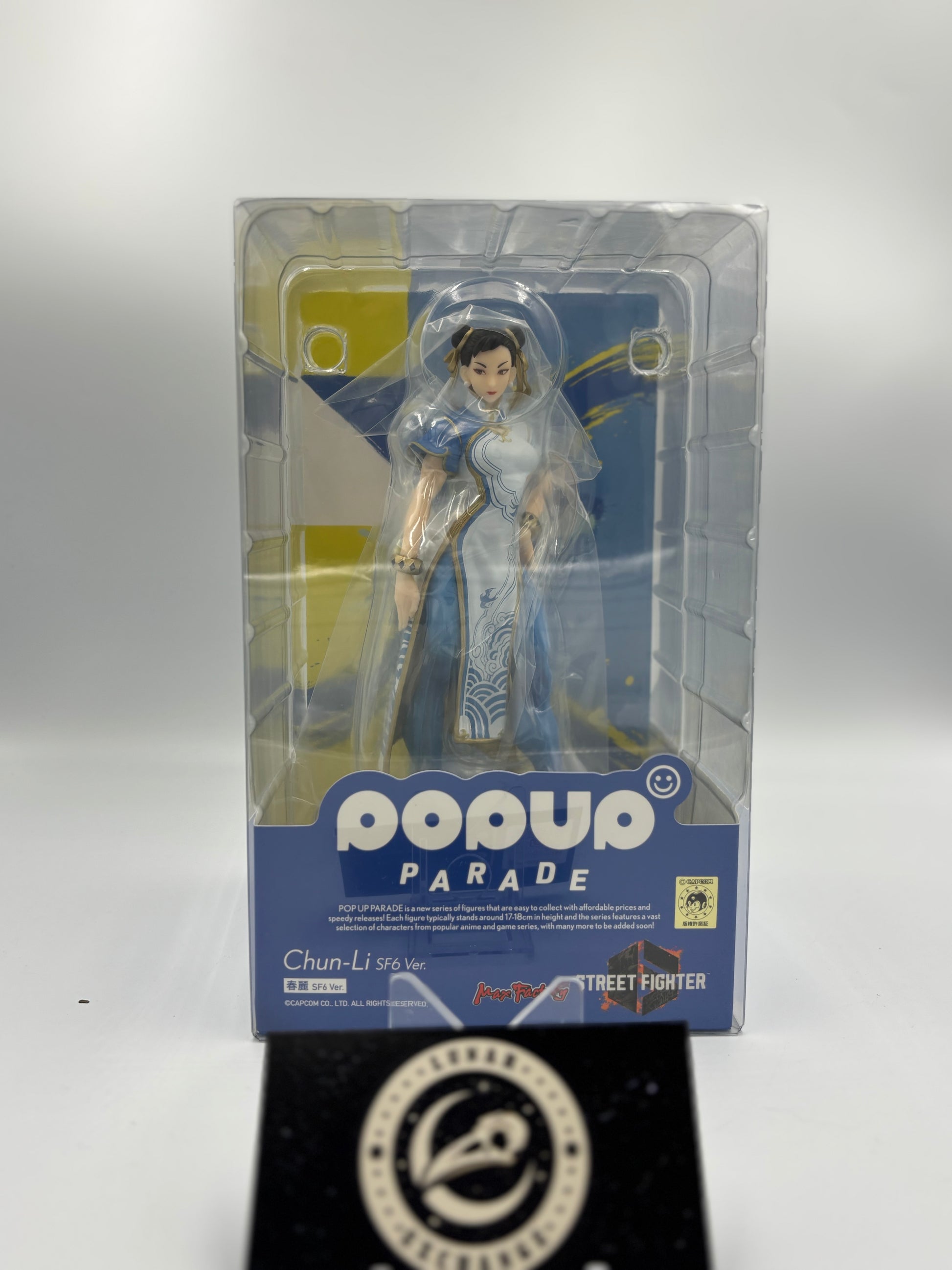 Packaged figure in its box