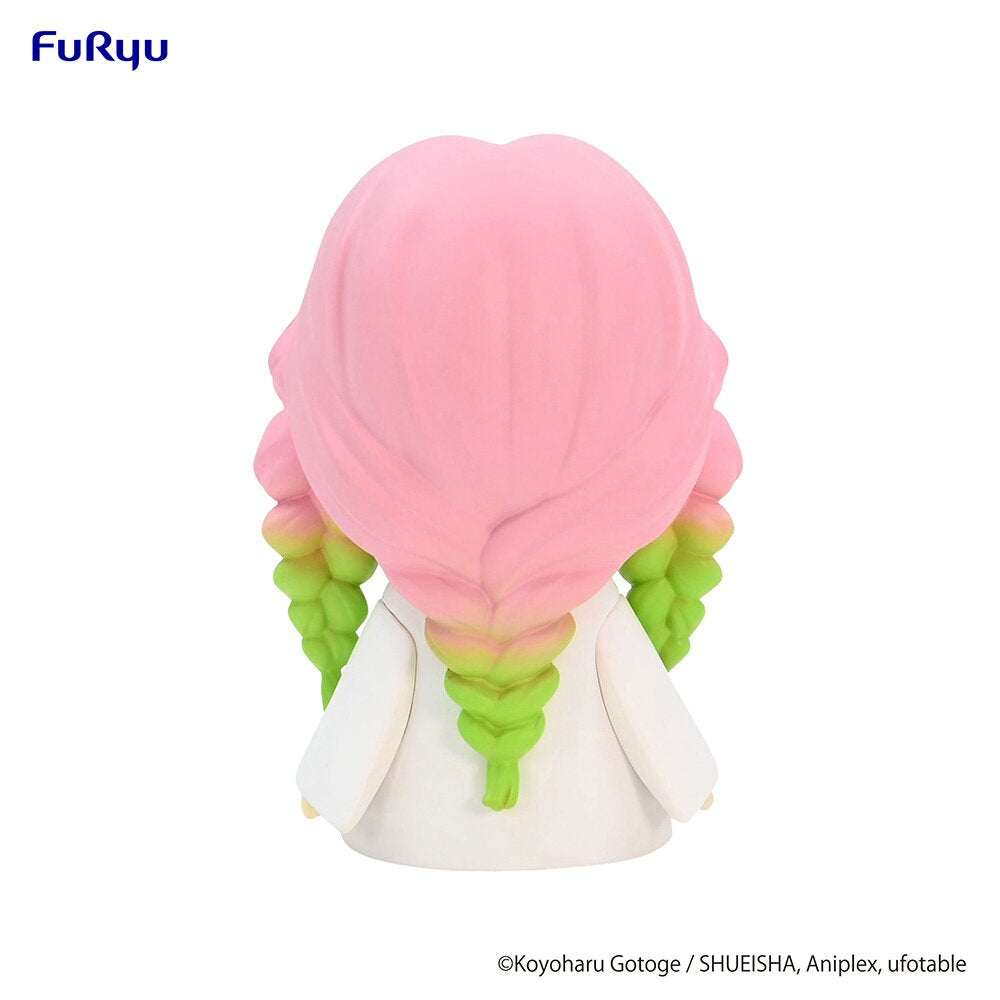 Rear view highlighting the figure's detailed hair and outfit.