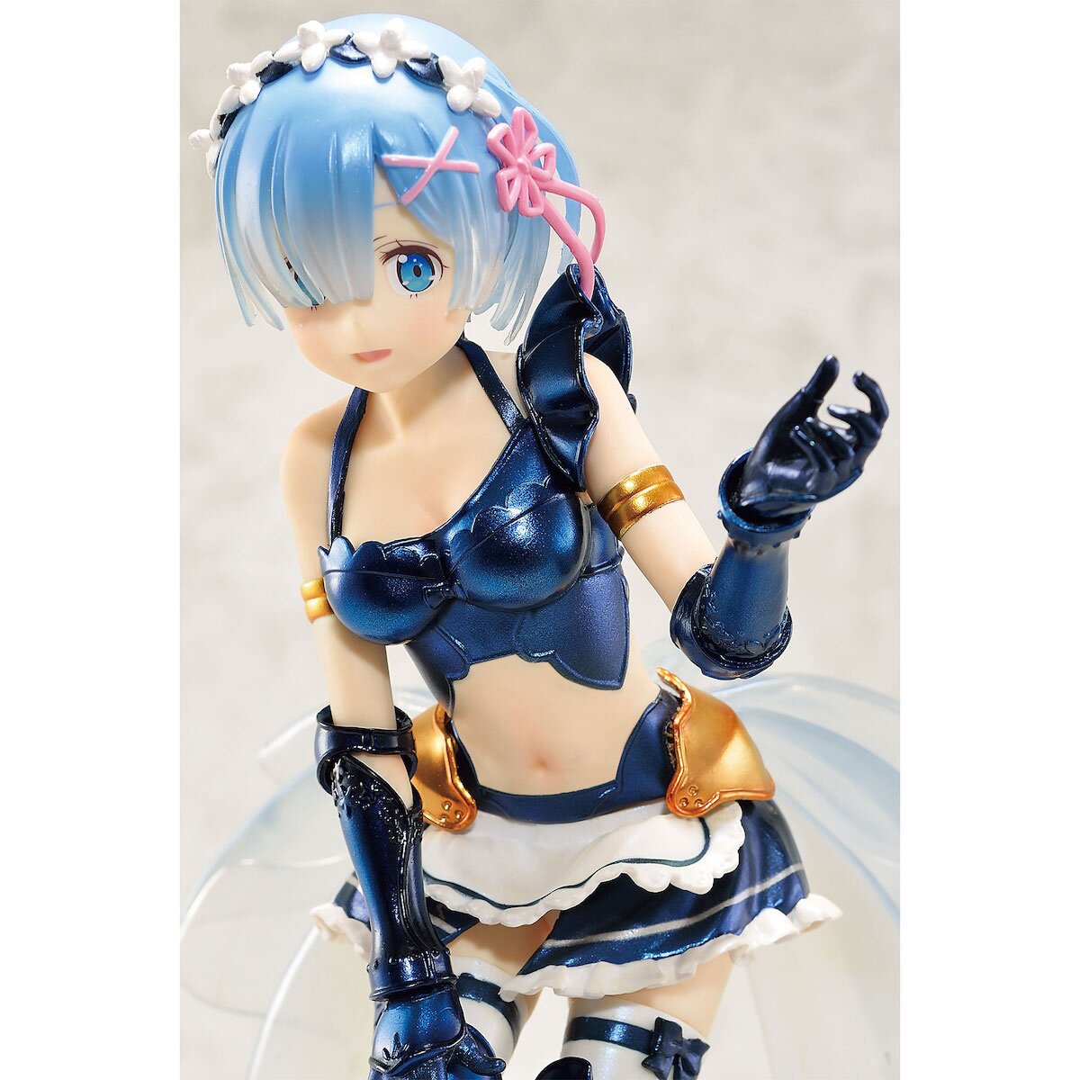 Close-up highlighting Rem's facial expression and ornate headpiece.