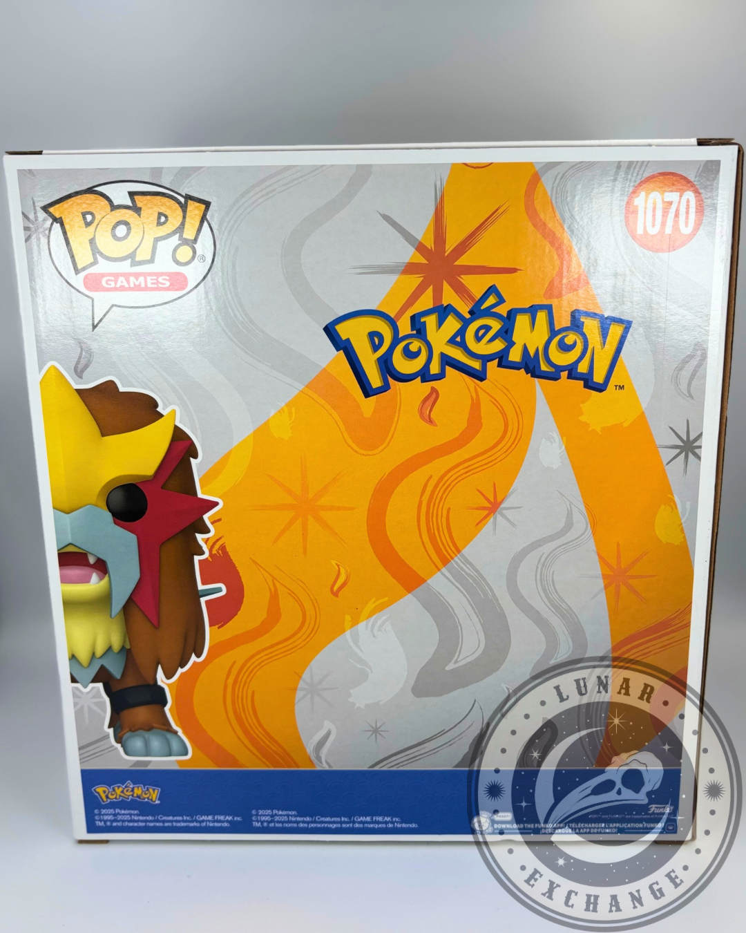 Back of the Entei Funko Pop! packaging featuring the Pokémon logo, stylized flame background, and illustration of the Entei figure.