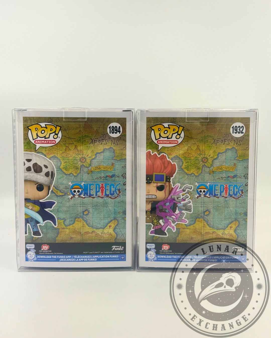 Backside of Funko Pop! boxes for Eustass Kid and Trafalgar Law, showcasing One Piece world map background.