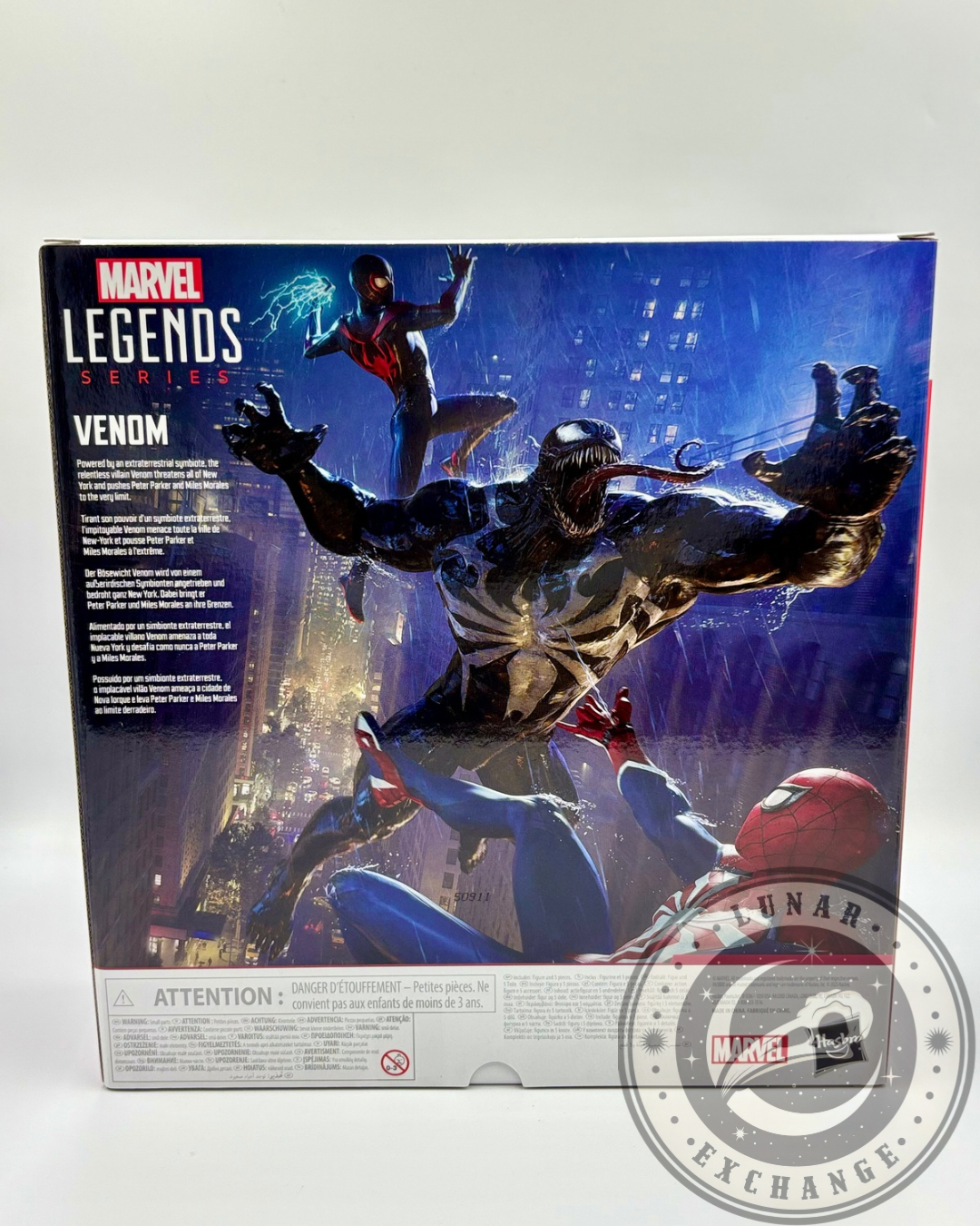 Rear of Marvel Legends Spider-Man 2 Venom box featuring action-packed cityscape artwork with Spider-Men and Venom.