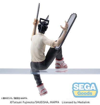 Back view showcasing Denji’s dynamic pose and chainsaw arms.