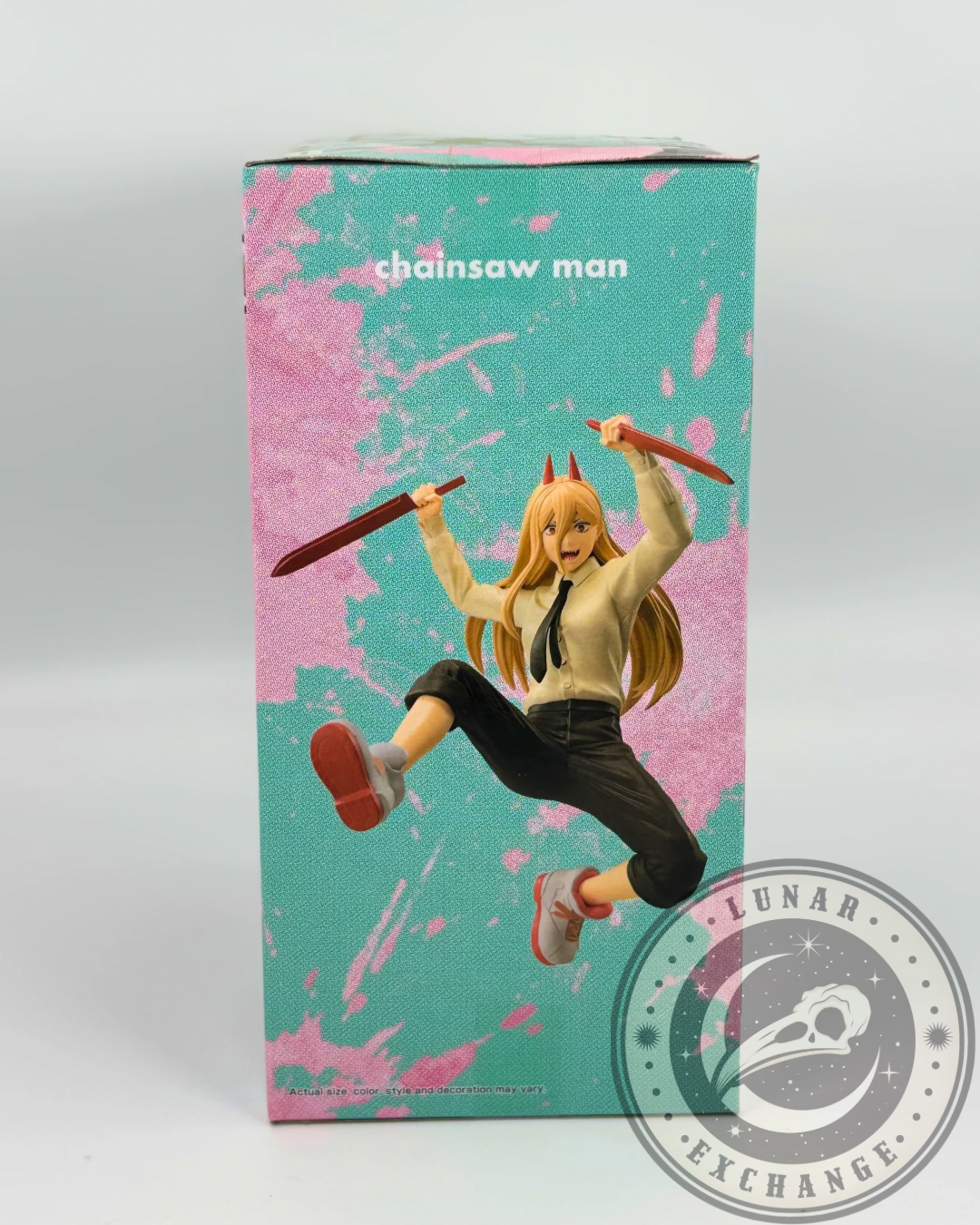 Side of the figure’s packaging featuring the Power figure in mid-air with swords, styled on a pink and teal backdrop.