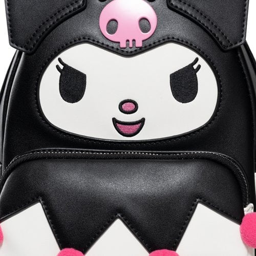 Close-up image of Kuromi’s face with pink nose, raised eyebrows, and molded pink skull on her forehead.