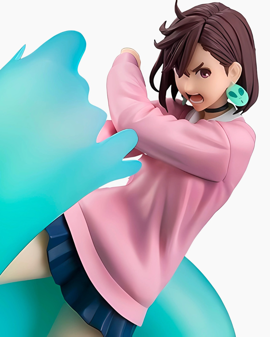 Detailed close-up of Momo Ayase's angry expression, showing her iconic teal earrings and dynamic pose from Dandadan.