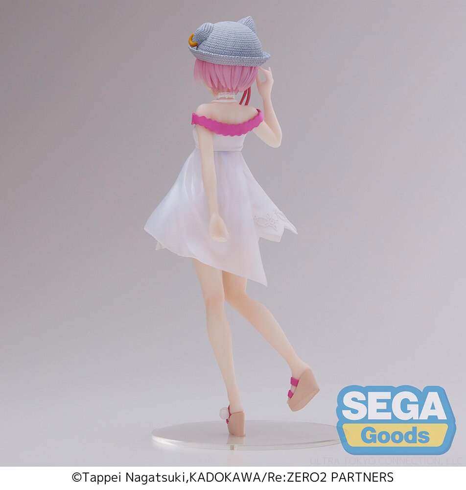 Rear view displaying the figure's sculpted hair and translucent dress details.