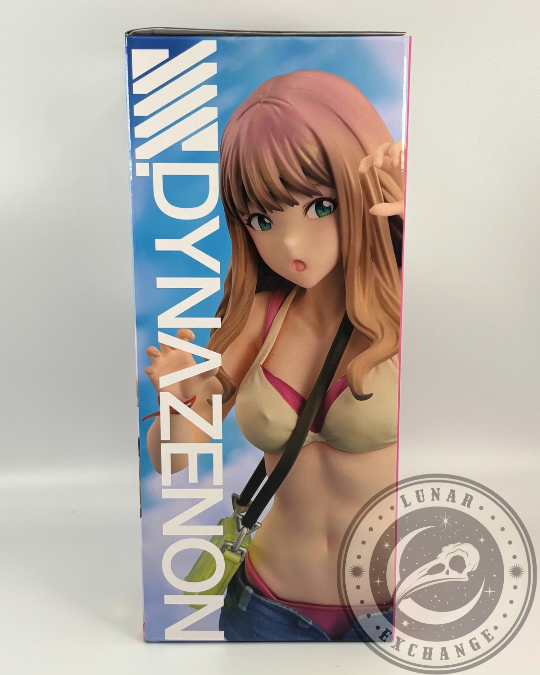 Front-left view of DYNAZENON Minami Yume 1/7 scale figure by Union Creative, showing the beach-themed outfit and vibrant box art.