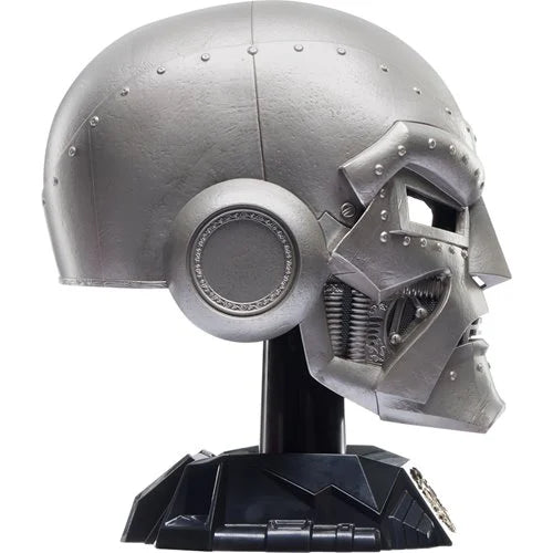 Left profile of the Doctor Doom helmet replica on display stand, no hood.