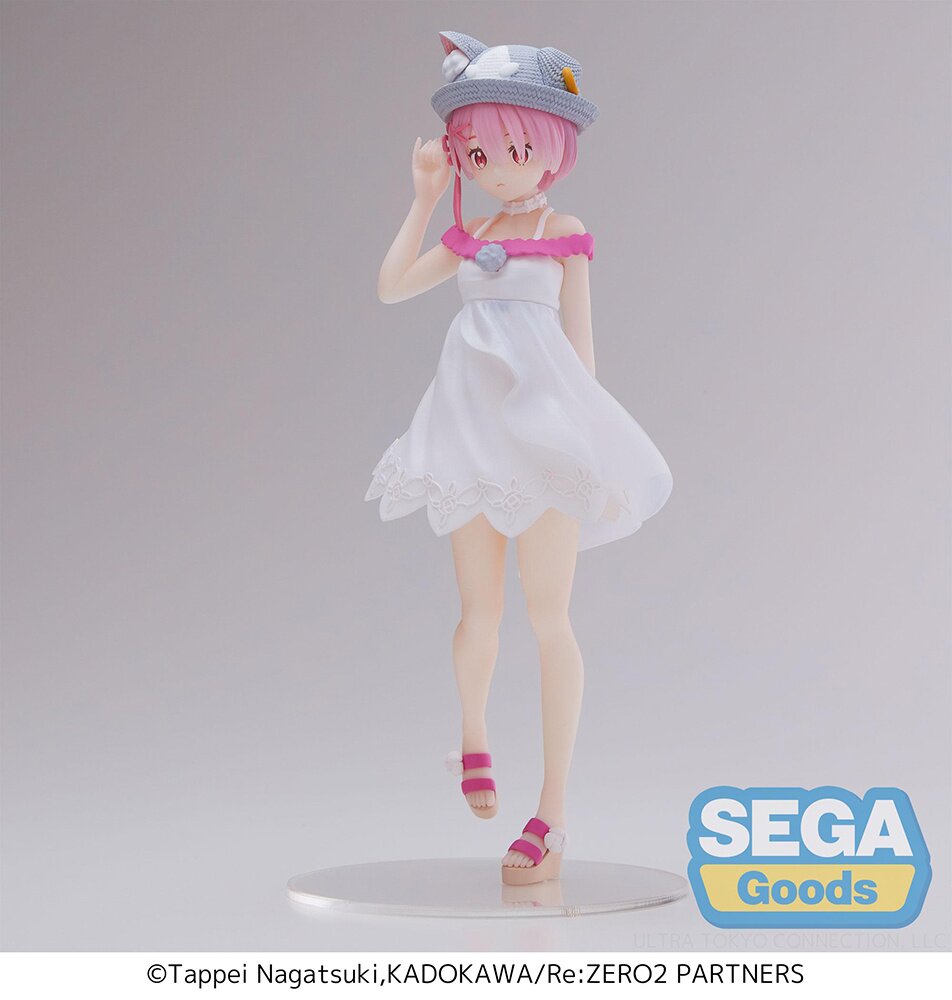 Side profile showcasing Ram's cat-ear straw hat and flowing dress.