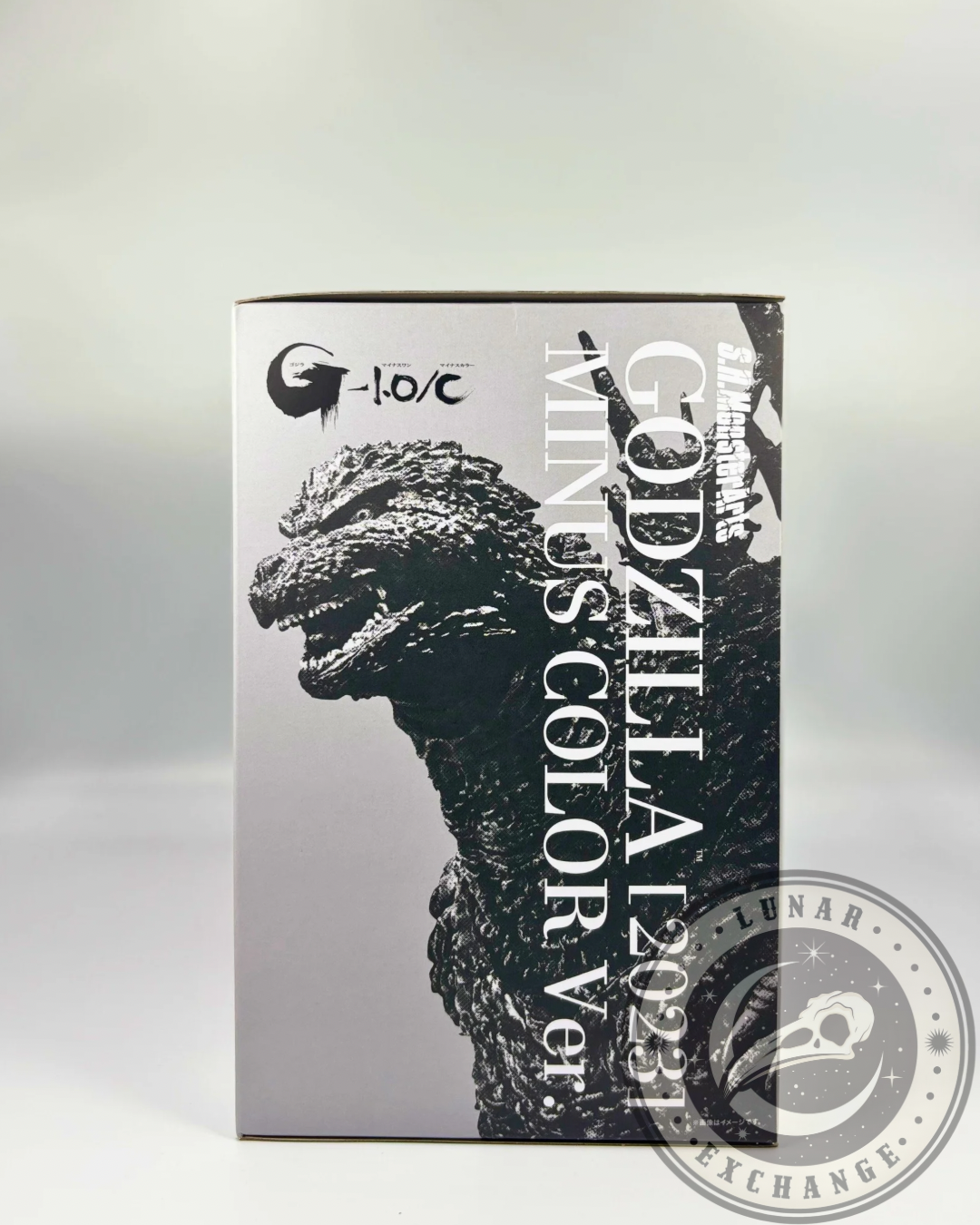 Side view of Godzilla Minus One packaging with vertical title and up-close shot of the kaiju’s face and torso.