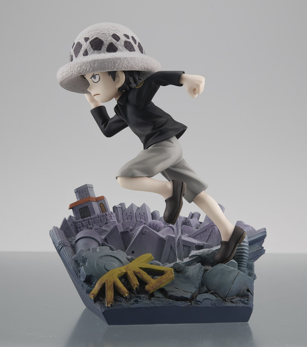 Side view of One Piece Trafalgar Law Run! Run! Run! figure showcasing premium sculpting and shading.