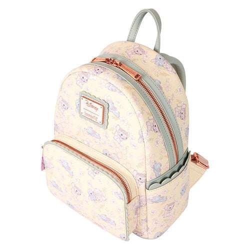 Side view of Loungefly Stitch cherry blossom mini-backpack, highlighting adjustable straps and floral patterns.