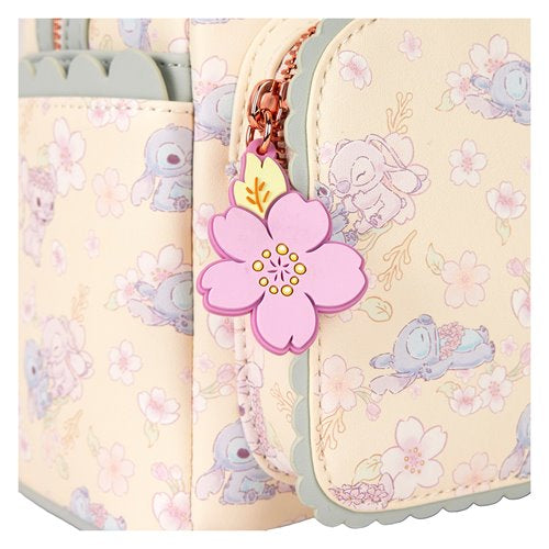 Close-up of Loungefly Lilo & Stitch Cherry Blossom backpack showcasing faux leather material and embroidered details.