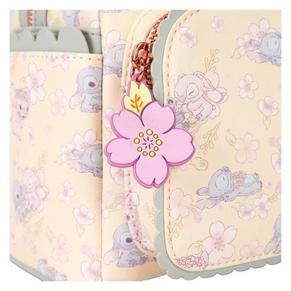 Close-up of Loungefly Lilo & Stitch Cherry Blossom backpack showcasing faux leather material and embroidered details.
