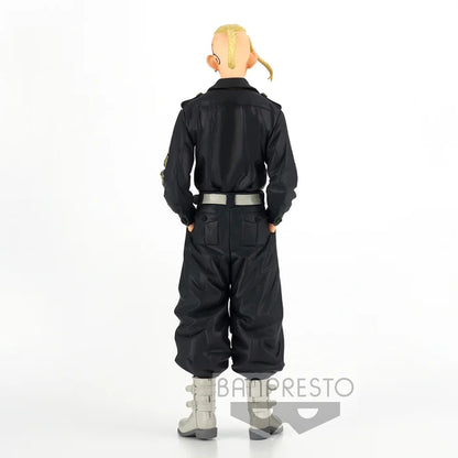 Back view showing Toman uniform details and hands-in-pockets pose.