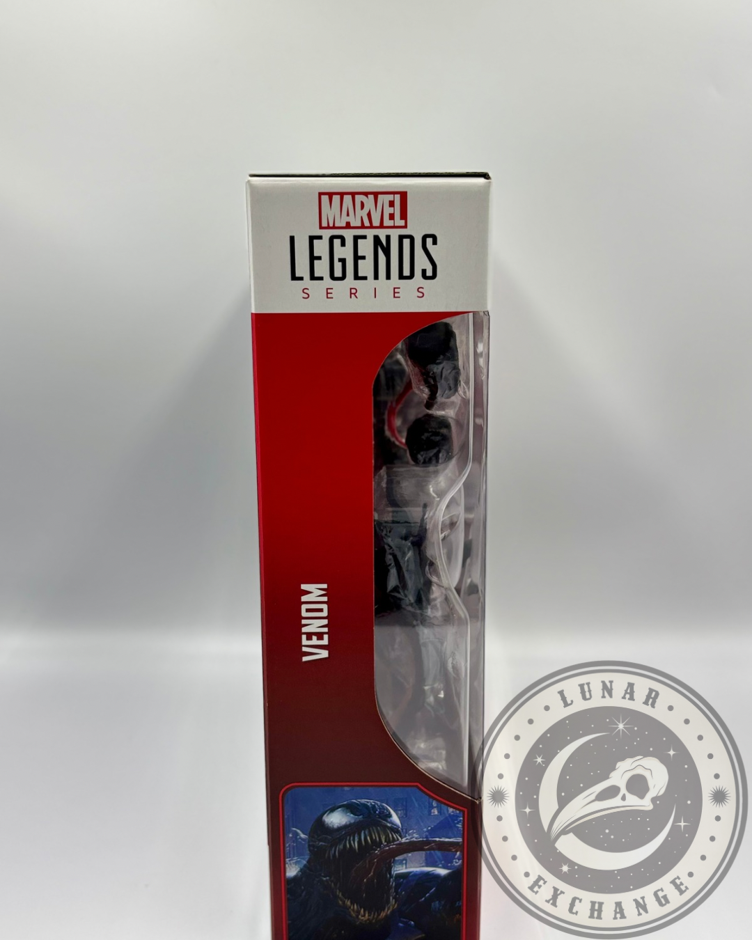 Side view of Venom's box from the Marvel Legends Gamerverse series, showing character name and illustration.