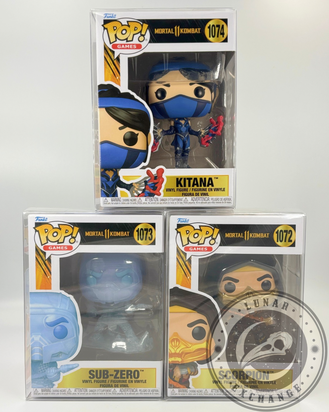 Front view of boxed Funko Pop! Mortal Kombat 11 figures: Kitana on top, Sub-Zero and Scorpion below.