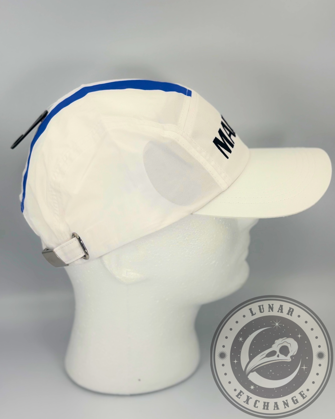Profile view of the One Piece Marine cap on a mannequin head, highlighting the curved brim and adjustable strap.