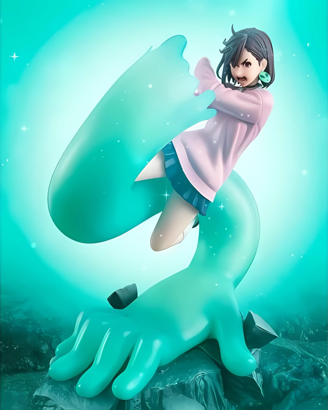 The FiguartsZERO Momo statue displayed with glowing blue aura and particle effects, highlighting the supernatural power.