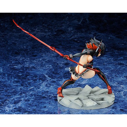 Rear angled view of Ryuko Matoi showing dynamic motion and hair sculpt detail, blade raised behind.