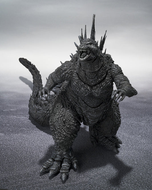 Godzilla Minus One 2023 figure in dynamic roaring pose, front view with sharp dorsal fins and textured sculpting.