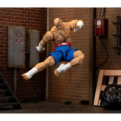 Sagat action figure in mid-air side kick with dynamic pose in alleyway.