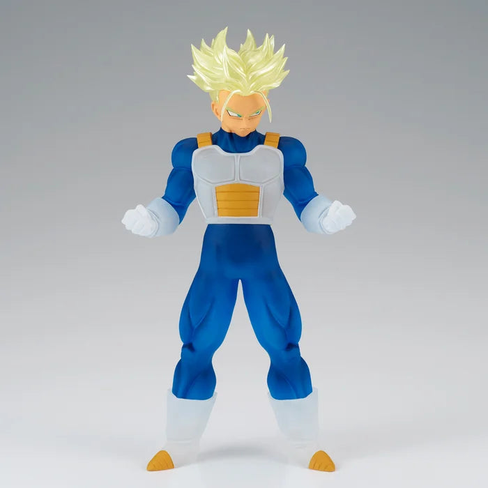 Close-up of Super Saiyan Trunks’ face and clenched fists.