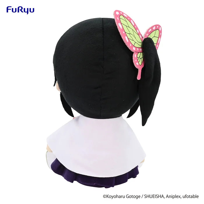 Back view of Kanao plush toy showing cape and outfit details.